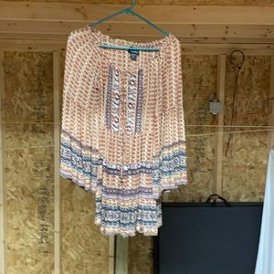 This is a top It is hard to see in the picture but the sleeves are very flowing.